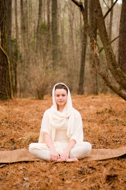 Woman Doing Yoga In The Forest