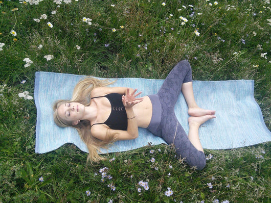 Woman Doing Exercise Yoga Using Blue Yoga Mat
